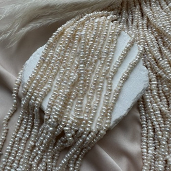 Жемчуг натуральный "Рис" плоский, 2*4 мм, 17 см нить